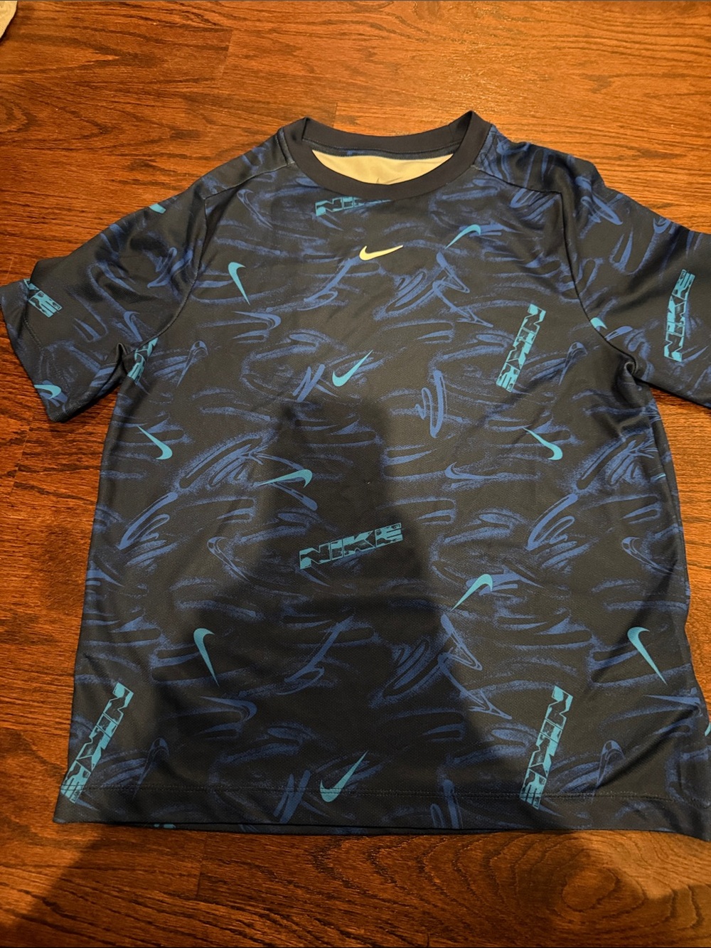 Nike kids Dark dri fit t-shirt with Teal Accents